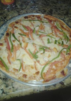Una foto de Pizza con masa de pastelito