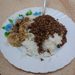 A picture of Lentils with rice.