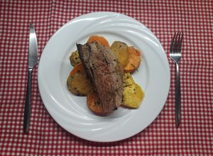 Una foto de Pulpón con boniatos al horno