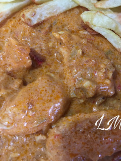 Una foto de Pollo al estilo tikka masala en olla GM