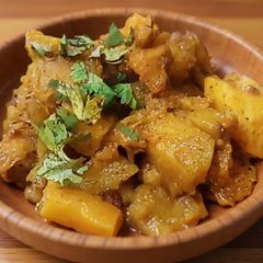 A picture of Bengali recipe Kumror Chhokka (Pumpkin Masala Curry).