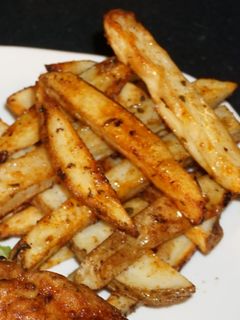 Una foto de PAPAS HORNEADAS CON YERBAS FRESCAS. JON STYLE