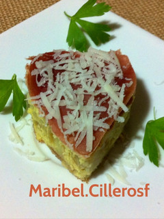 Una foto de Pincho corazón de tortilla Española, jamón y queso