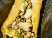 Una foto de tamal de chicharo