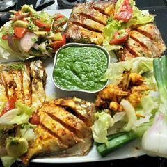 A picture of Tandoor Promfret and prawns.