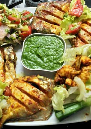 A picture of Tandoor Promfret and prawns.