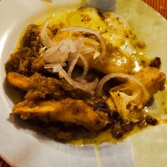 A picture of Arvi ka dry salan with roti and namkeen lassi.
