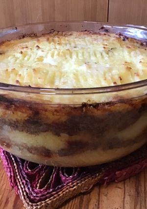 Une photo de Parmentier étagé au porc,girolleset tomates séchées