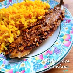 A picture of Mackerel in the oven with garlic.