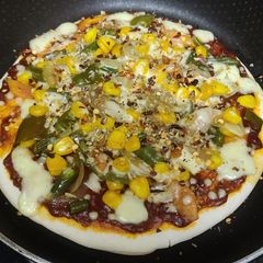 Tawa cheese vegetable pizza A picture of Tawa cheese vegetable pizza.