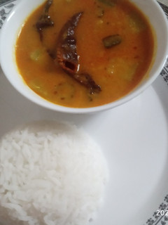 A picture of Sambhar rice.