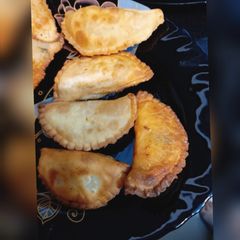 A picture of D shape samosa.