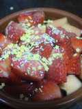 Papaya con fresas y moscatel