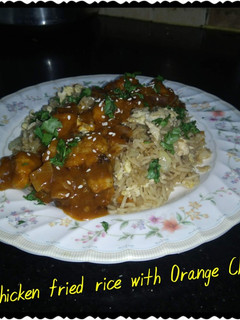 A picture of Chicken fried rice with orange chicken.