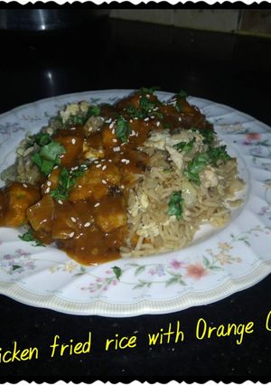 A picture of Chicken fried rice with orange chicken.