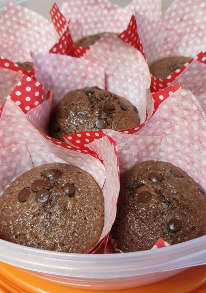 Una foto de Magdalenas con relleno de chocolate negro y coco