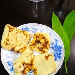 A picture of Instant Haladipatra Pitha (pitha with turmeric leaf).