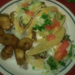 Seared steak tacos w side of sweet fried plantains A picture of Seared steak tacos w side of sweet fried plantains.