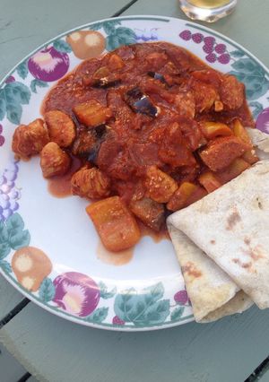 A picture of Chicken and aubergine curry.