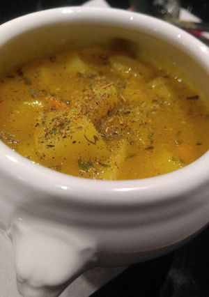 A picture of (NOT cream of) Potato soup w/Carrots, Cerleriac and fresh herbs.