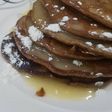 Chocolate pancake with condensed milk topping