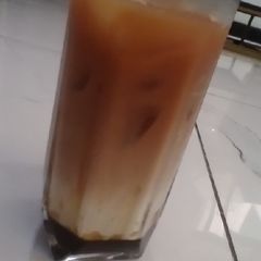 A picture of Iced Tea Teh C Peng.