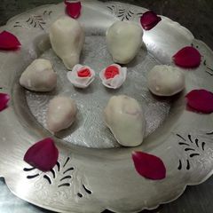 A picture of White chocolate coated strawberry.