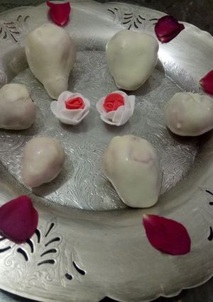 A picture of White chocolate coated strawberry.