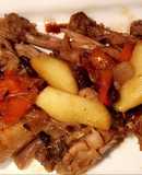 Pollo con manzanas y pasas