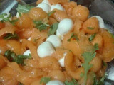 Melone con mozzarelle ciliegine prosciutto crudo e rucola