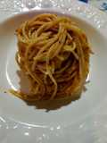 Spaghetti with Genovese Pesto, Pecorino Romano, Toasted Walnuts, and Chopped Pistachios