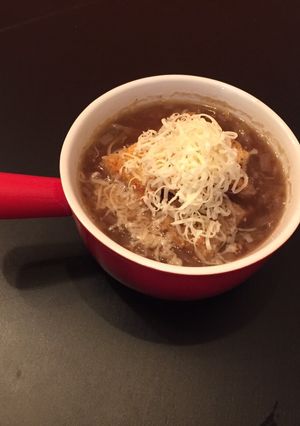 A picture of French Onion Soup with Parmesan/Mozzarella Croutons.
