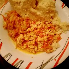A picture of Ugali,cabbage mixed with fried eggs.