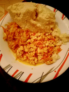 A picture of Ugali,cabbage mixed with fried eggs.