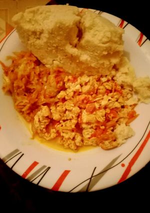 A picture of Ugali,cabbage mixed with fried eggs.