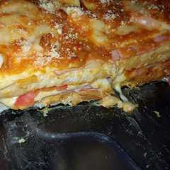 A picture of Lasagna de jamón y queso.