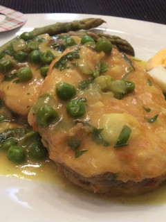 Una foto de Merluza en salsa verde