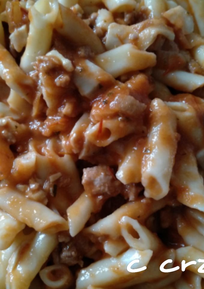 Una foto de Macarrones con boletus y tomate