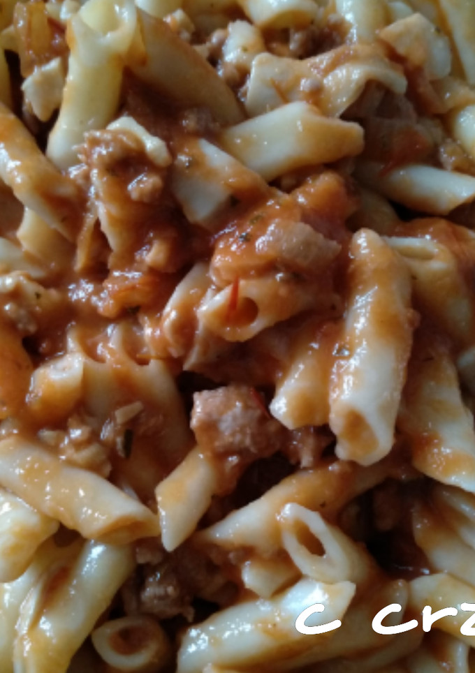 Una foto de Macarrones con boletus y tomate