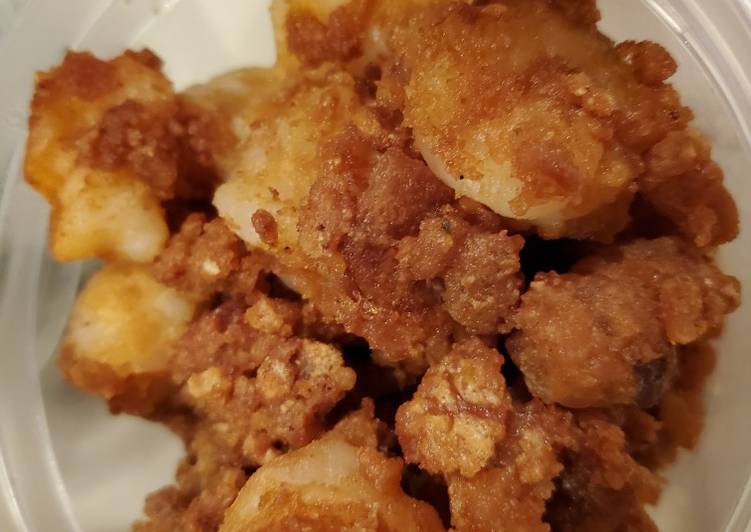 Pork rinds coated chicken fingers and shrimp