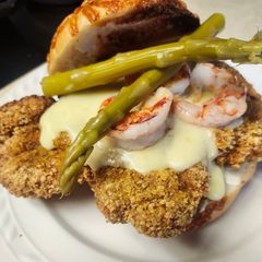 A picture of Brad's Schnitzel Oscar Burger.