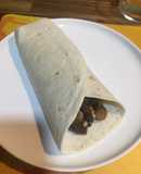 Taco de setas y morcilla de arroz