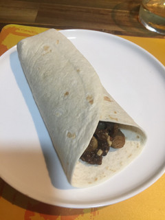 Una foto de Taco de setas y morcilla de arroz