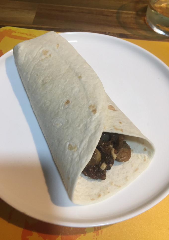 Una foto de Taco de setas y morcilla de arroz