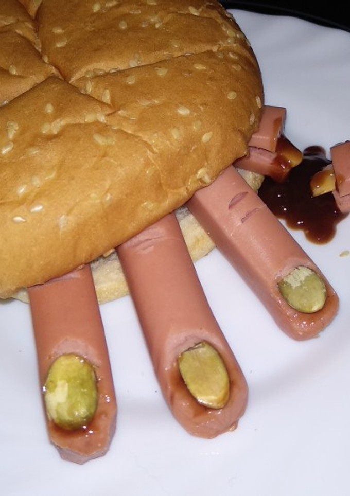 Una foto de La mano que mece... La hamburguesa! 🖐️🍔