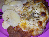Milanesa napolitana y papas al horno
