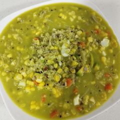 A picture of Corn and Avocado Porridge with Enoki Mushrooms.