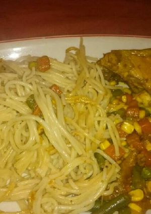A picture of Grilled Chicken with Spaghetti and veggies.