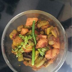 A picture of Pure veg Potatoes parwal curry.
