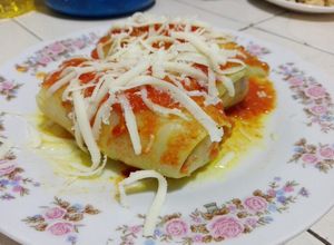 Una foto de Rollos de repollo rellenos con pollo y champiñones saludables.